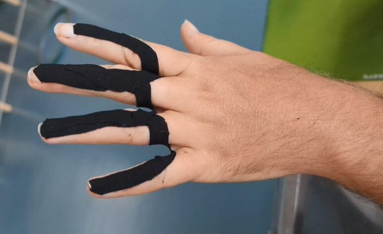 MS hand with tape