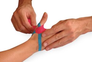 medical taping skiers thumb