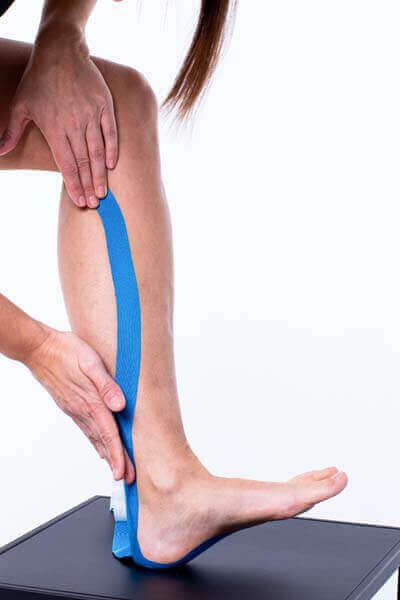 how to tape painful calves 3 - THYSOL Australia